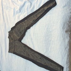 Lululemon Size 10 Black and Grey Striped Yoga Pants with side Mesh Panel.